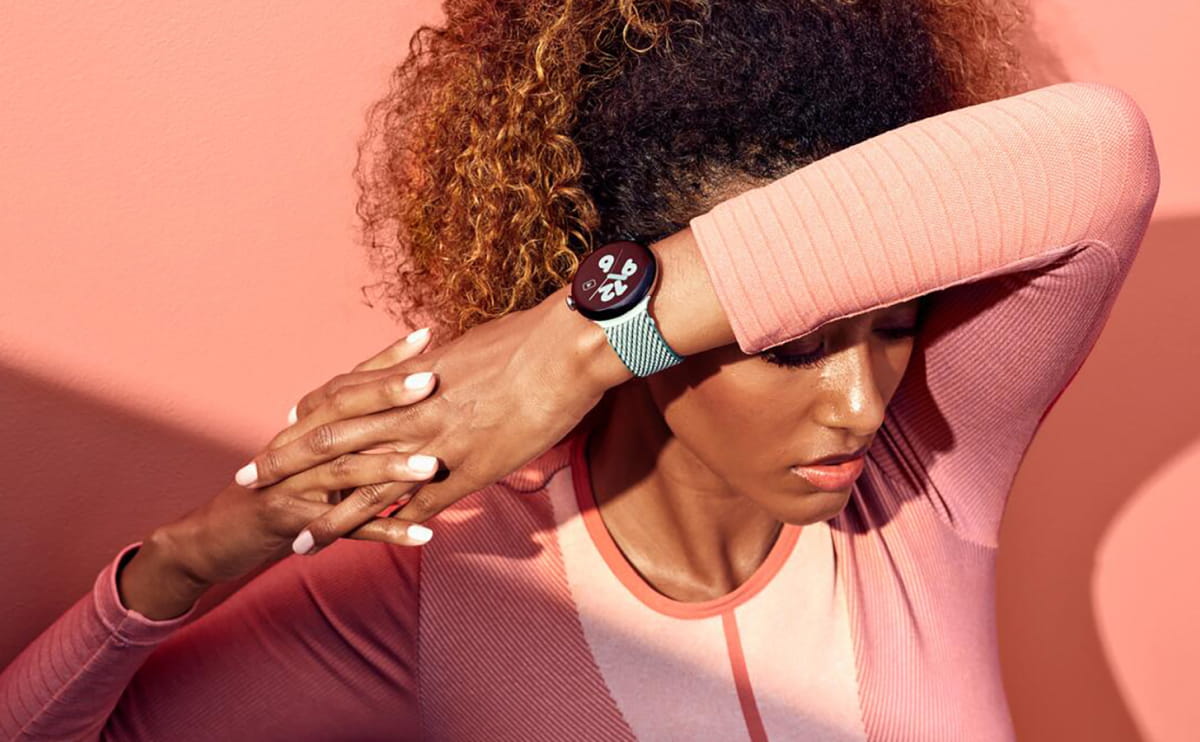 Smartwatch showing fitness information on a wrist